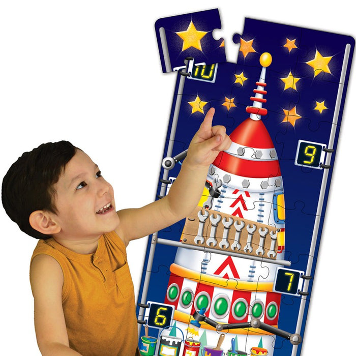 boy counting his way to the finish with the puzzle